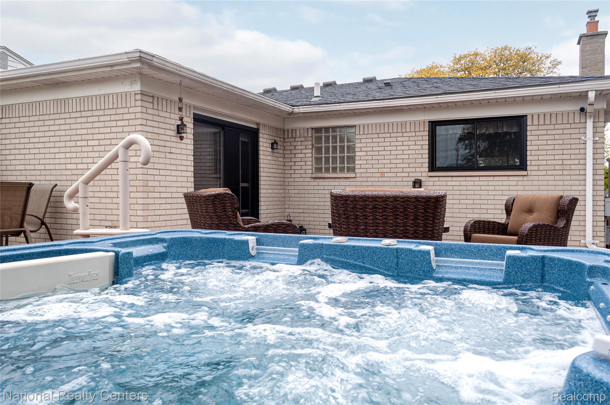 2446 Milverton Road Troy, MI 48083 - Photo 39 of 41 View of pool with a hot tub