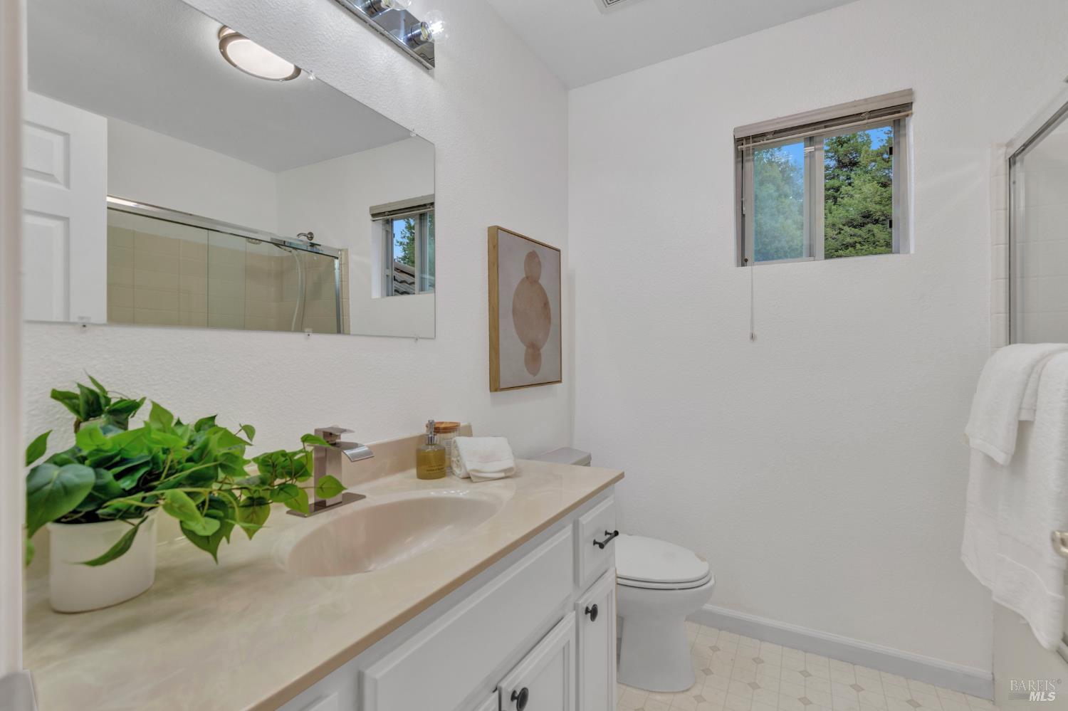 131 Sheila Court Vallejo, CA 94591 - Photo 23 of 36 The third bathroom is thoughtfully designed for shared use, serving two bedrooms and the office/guest room with ease and efficiency.
