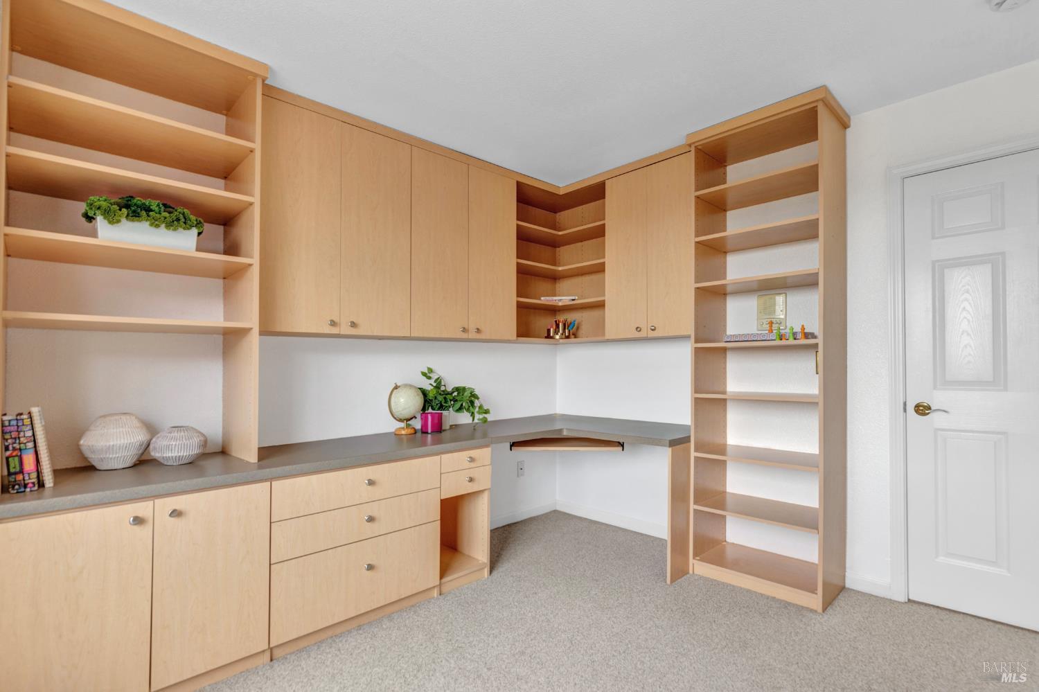 131 Sheila Court Vallejo, CA 94591 - Photo 25 of 36 The office features ample storage and flexible design, making it easily adaptable as a comfortable guest room when needed.