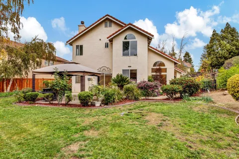 a view of a garden with a fountain