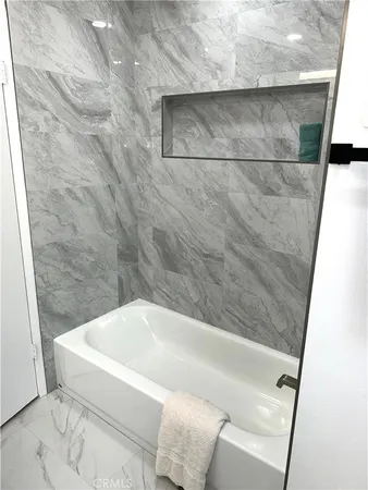 a bathroom with a bathtub