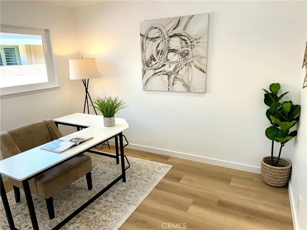 a view of a room with a table and chair