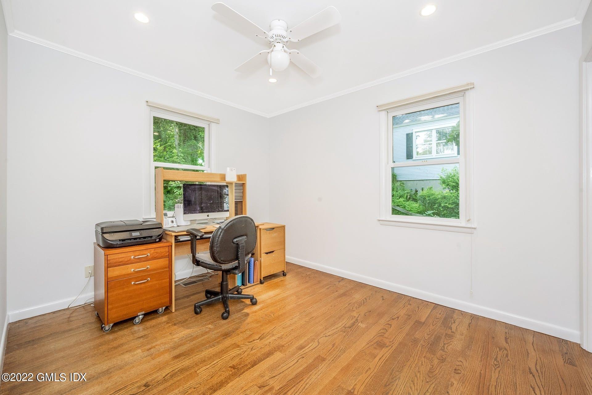 48 Valleywood Road Cos Cob, CT 06830 - Photo 16 of 25 a view of a workspace with furniture and a window
