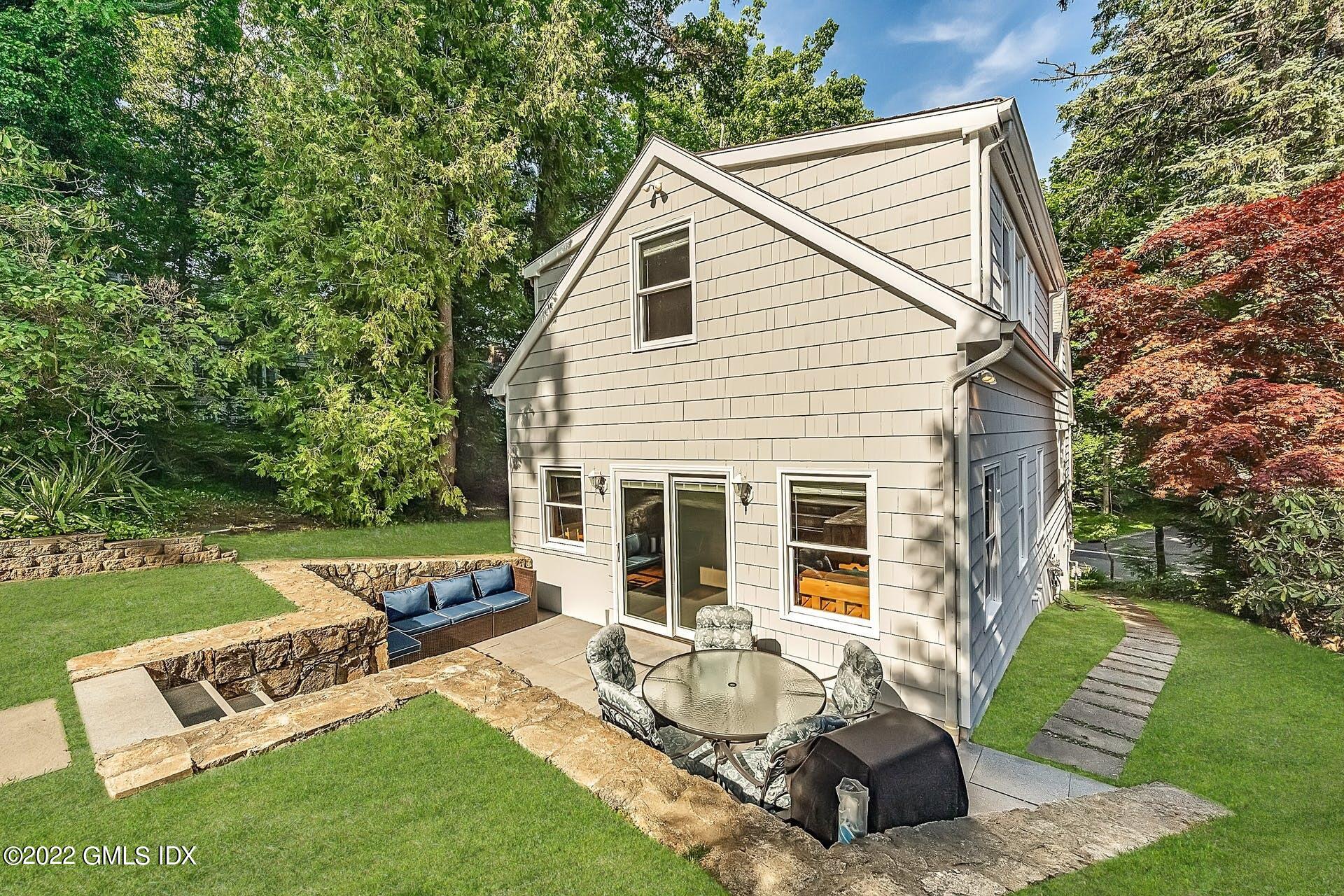48 Valleywood Road Cos Cob, CT 06830 - Photo 20 of 25 a view of house with backyard and sitting area