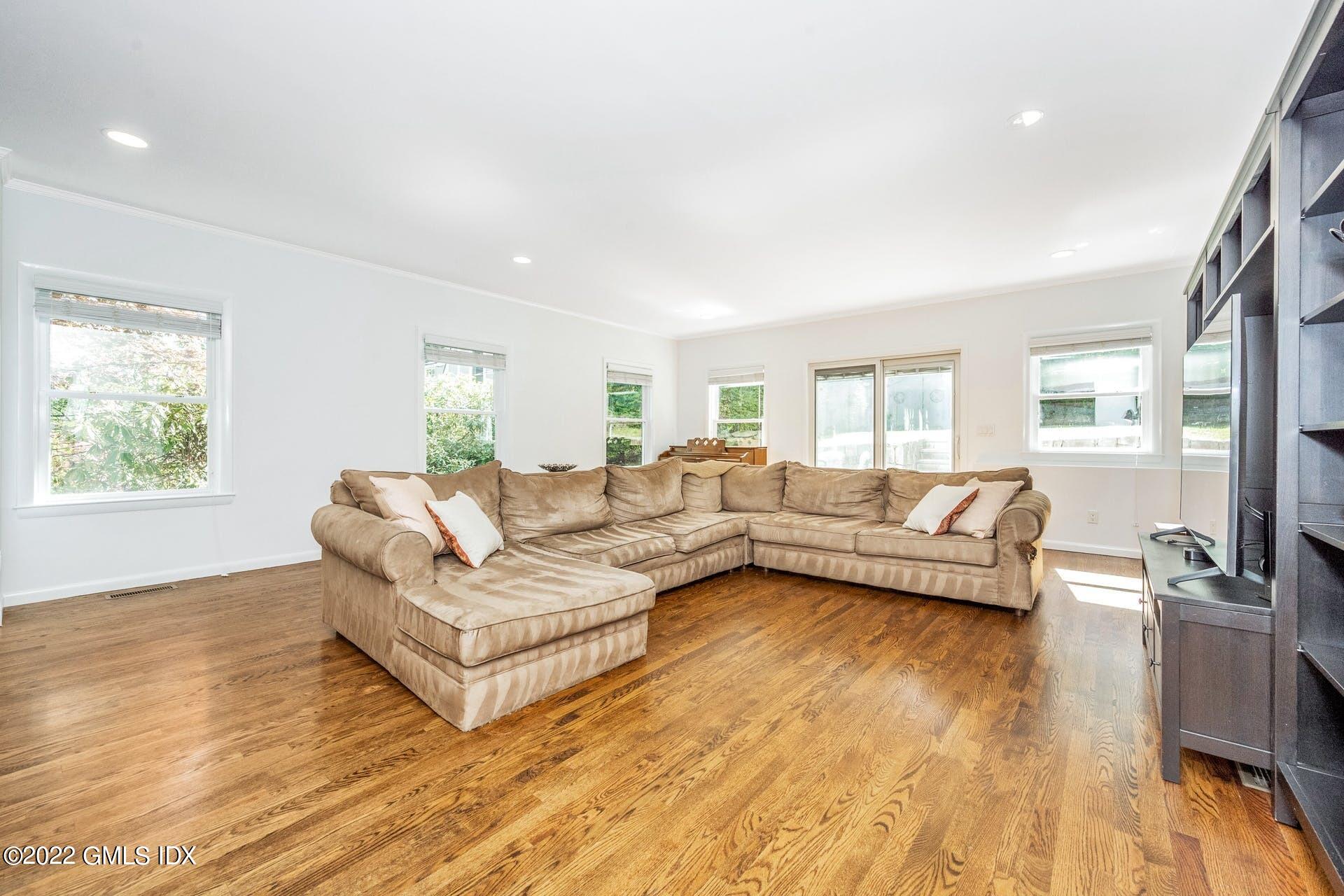 48 Valleywood Road Cos Cob, CT 06830 - Photo 3 of 25 a living room with furniture and a wooden floor