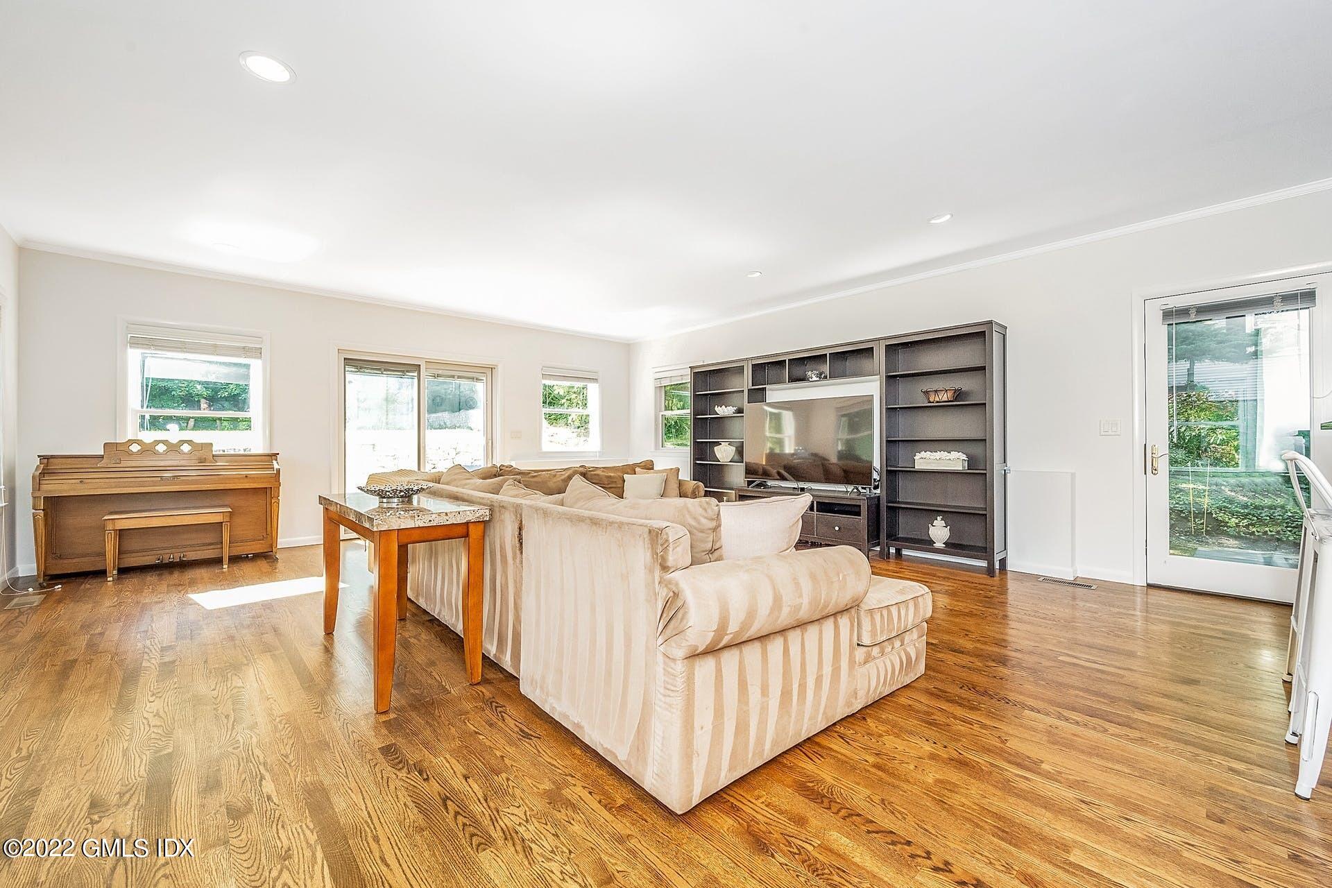 48 Valleywood Road Cos Cob, CT 06830 - Photo 4 of 25 a living room with furniture and a wooden floor