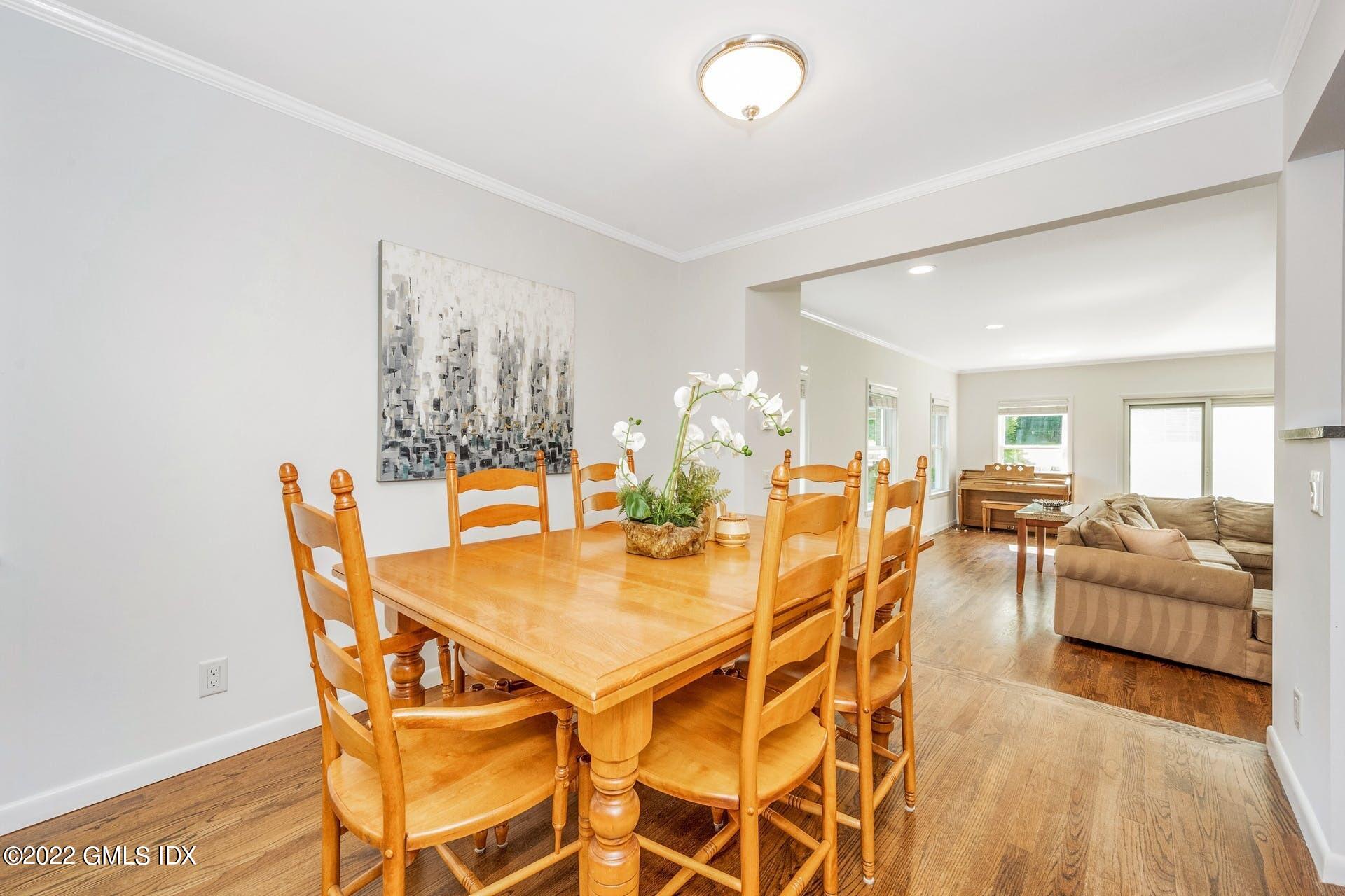 48 Valleywood Road Cos Cob, CT 06830 - Photo 5 of 25 a dining room with furniture and wooden floor