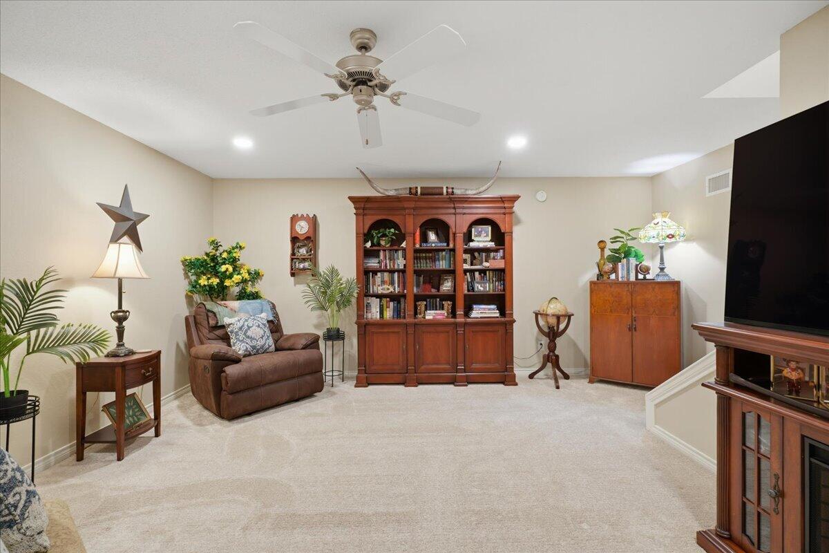 4612 100th Street Lubbock, TX 79424 - Photo 47 of 55 a view of a livingroom with furniture and cabinet in a living room