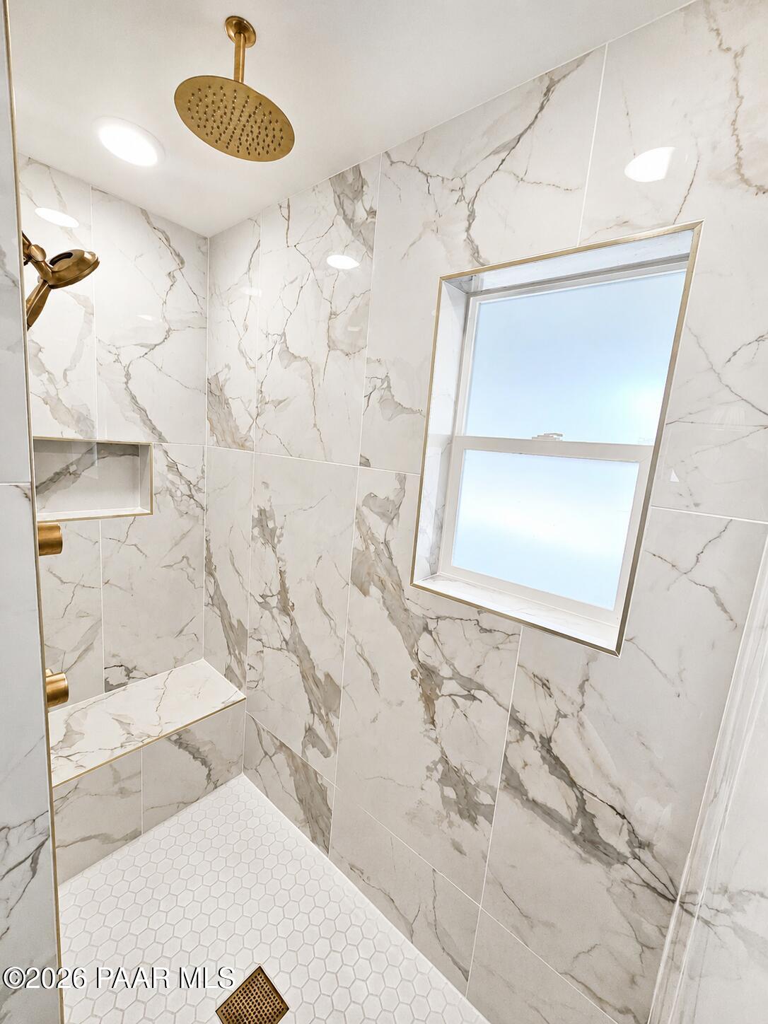 4920 East Amber Road Prescott, AZ 86301 - Photo 22 of 38 a bathroom with a bathtub and shower