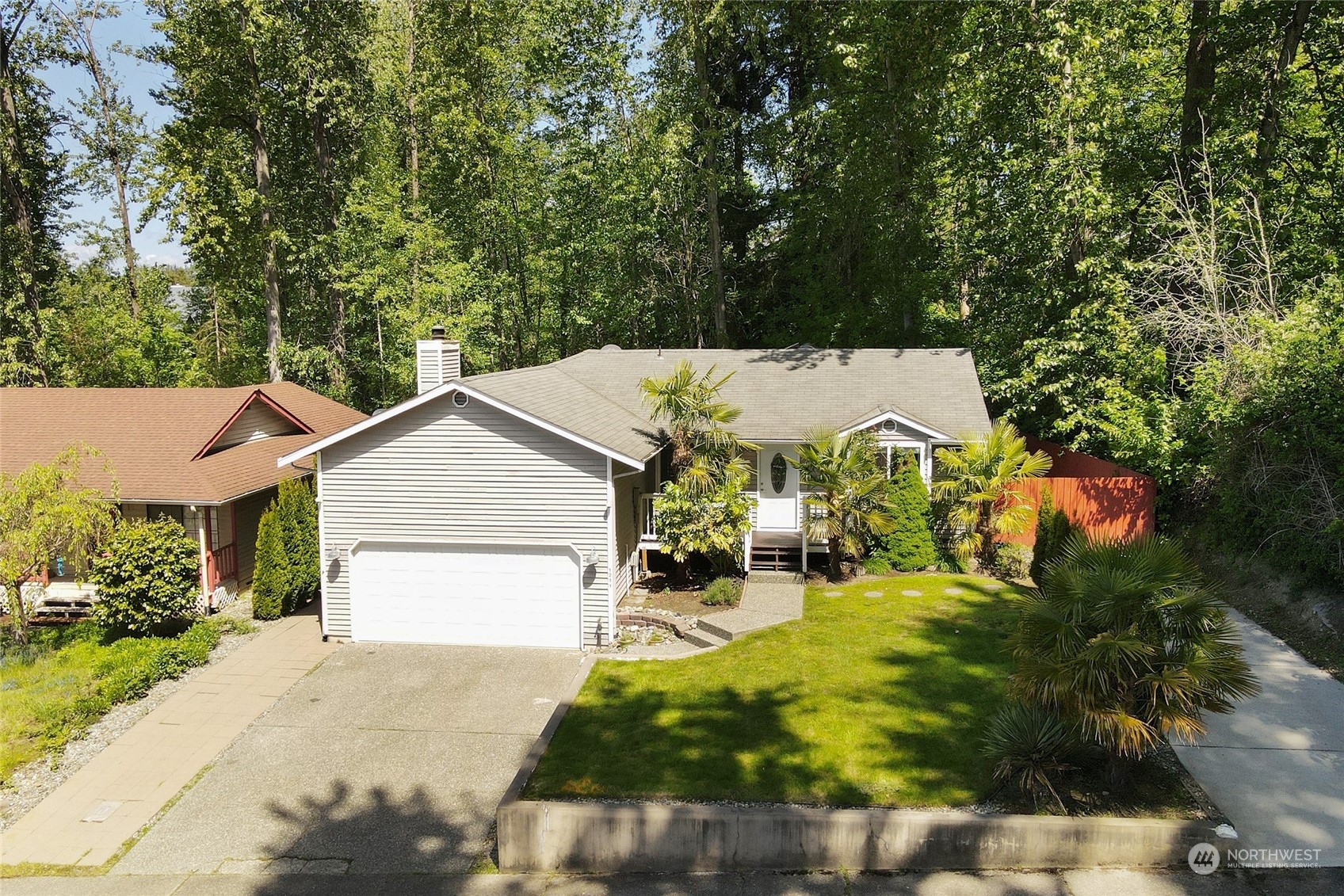 1211 232nd Place Southwest Bothell, WA 98021 - Photo 1 of 30 a view of a house with a yard and potted plants
