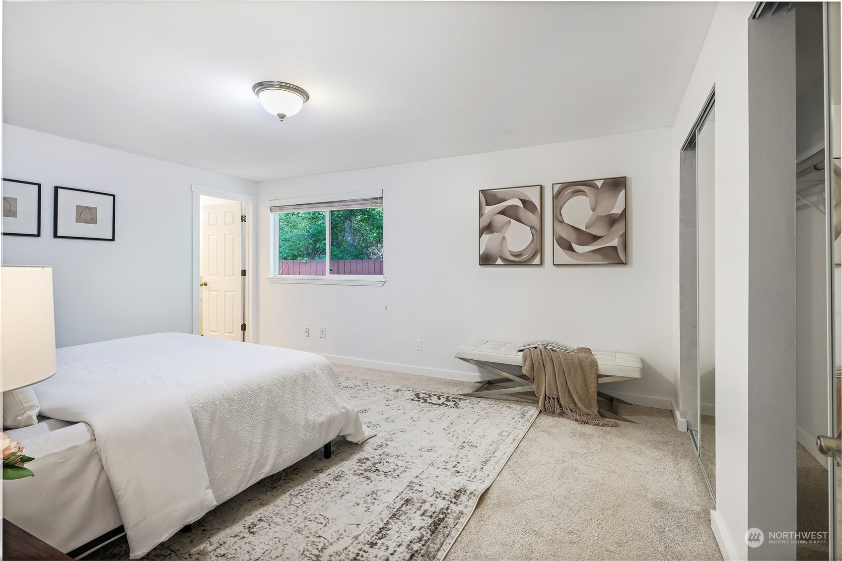 1211 232nd Place Southwest Bothell, WA 98021 - Photo 14 of 30 a bedroom with a bed and a painting on the wall