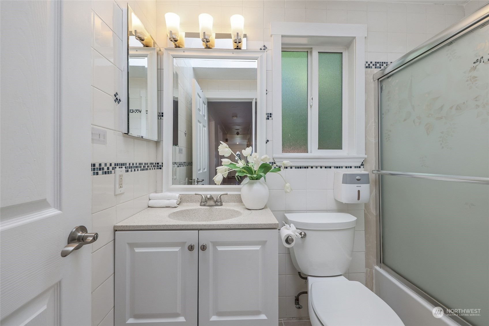 1211 232nd Place Southwest Bothell, WA 98021 - Photo 18 of 30 a bathroom with a granite countertop toilet sink and mirror