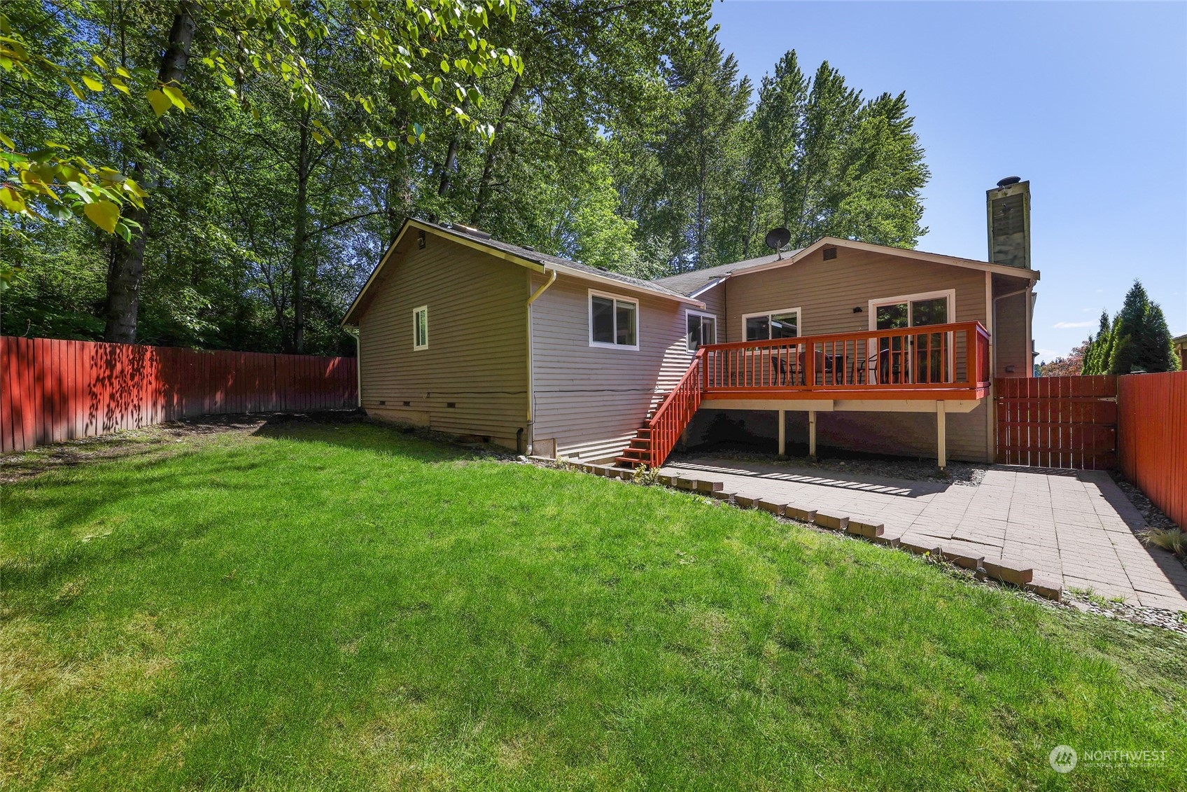 1211 232nd Place Southwest Bothell, WA 98021 - Photo 21 of 30 a front view of a house with garden