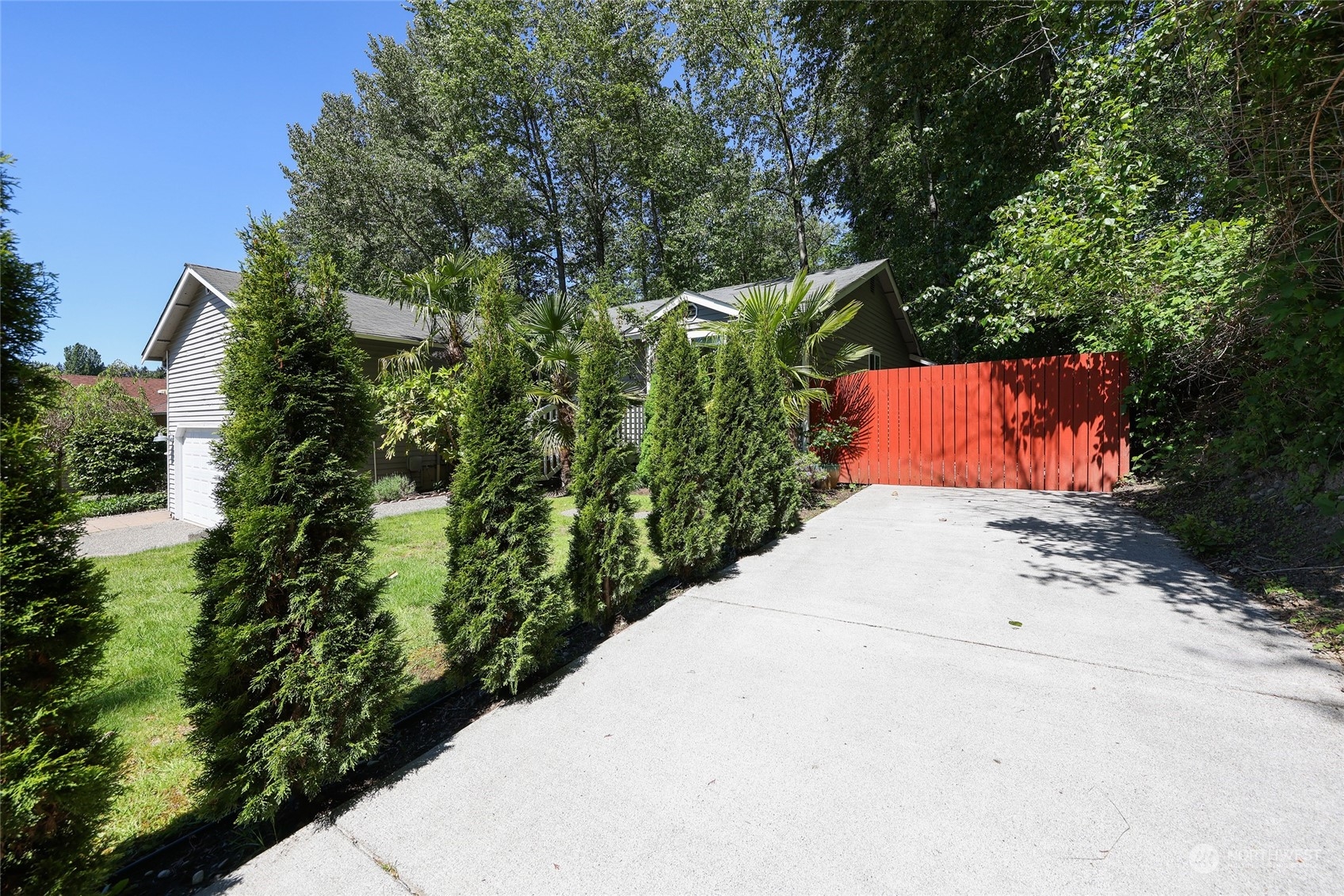 1211 232nd Place Southwest Bothell, WA 98021 - Photo 26 of 30 a view of a yard with plants