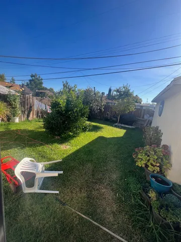 a view of a garden with an outdoor space