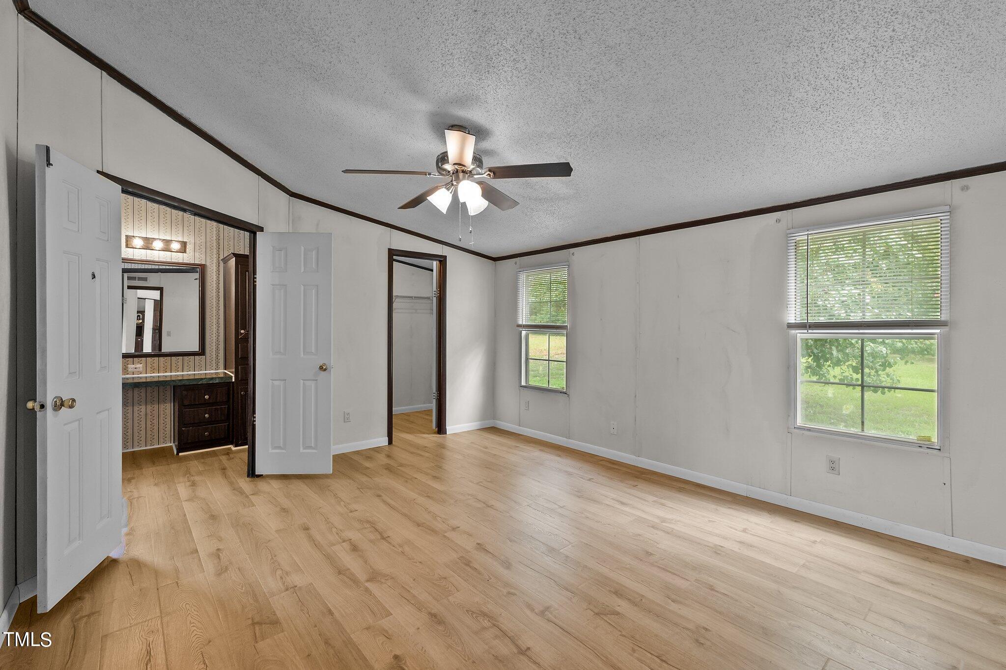5612 Zacks Mill Road Angier, NC 27501 - Photo 19 of 42 a view of an empty room with a window