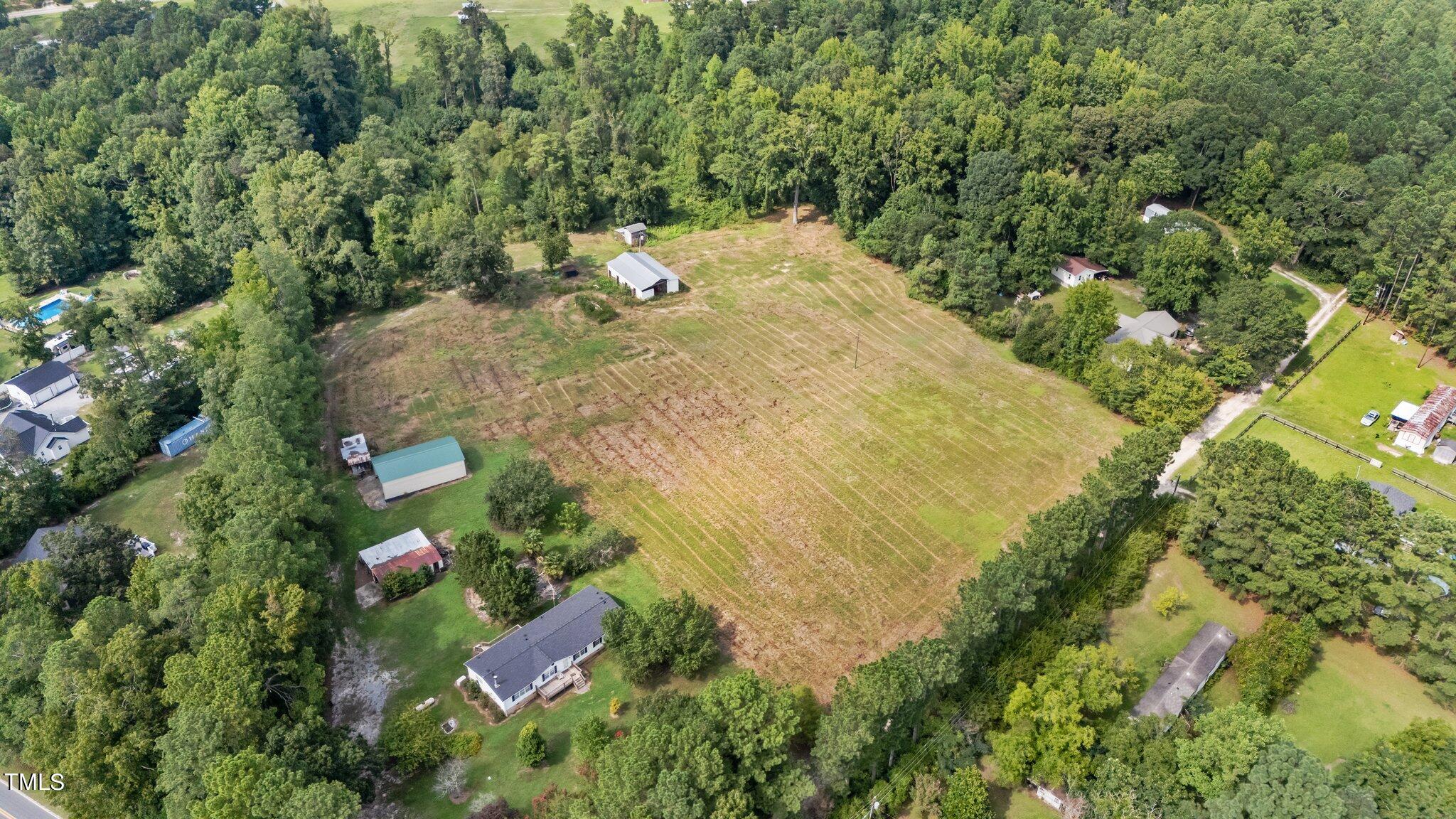5612 Zacks Mill Road Angier, NC 27501 - Photo 32 of 42 a view of a backyard of the house