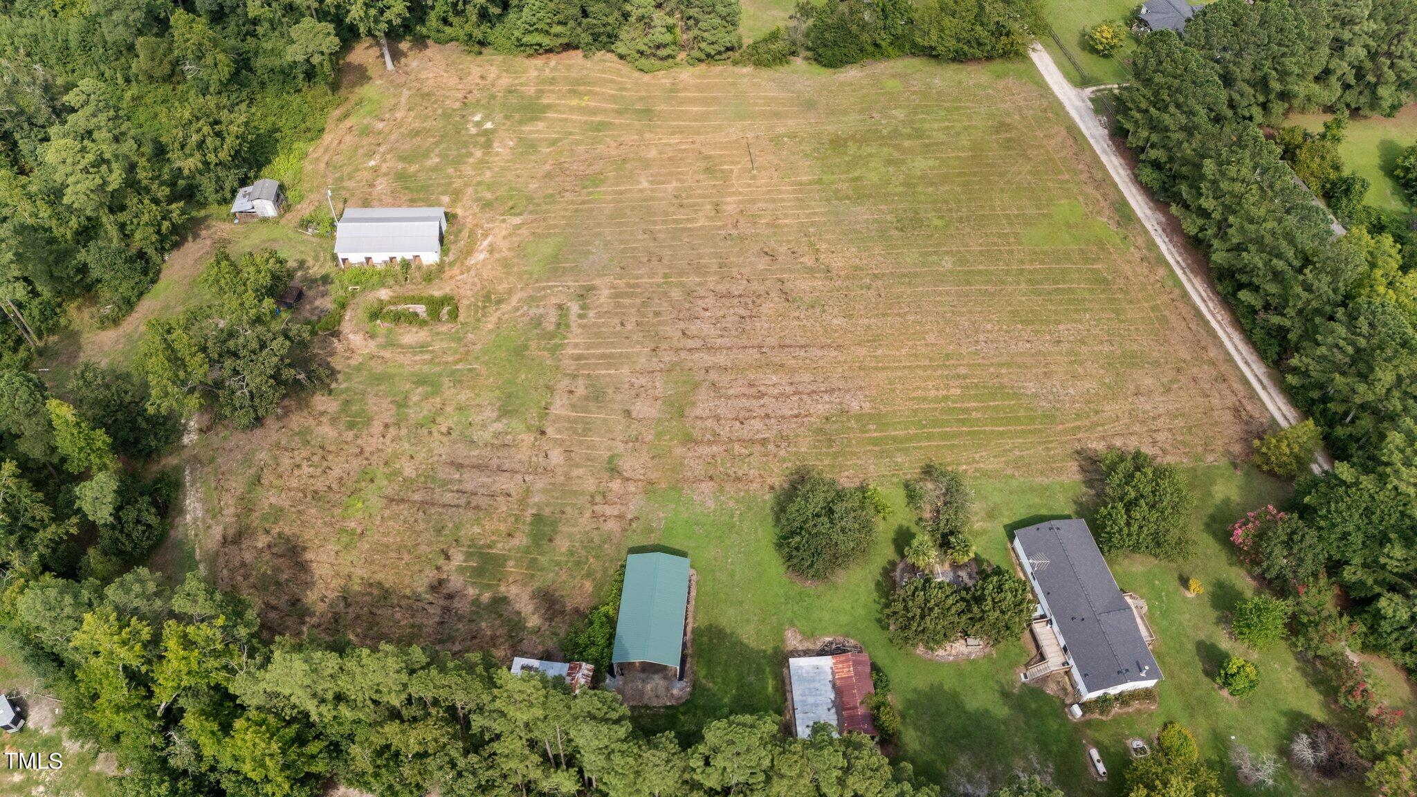 5612 Zacks Mill Road Angier, NC 27501 - Photo 33 of 42 a aerial view of a yard