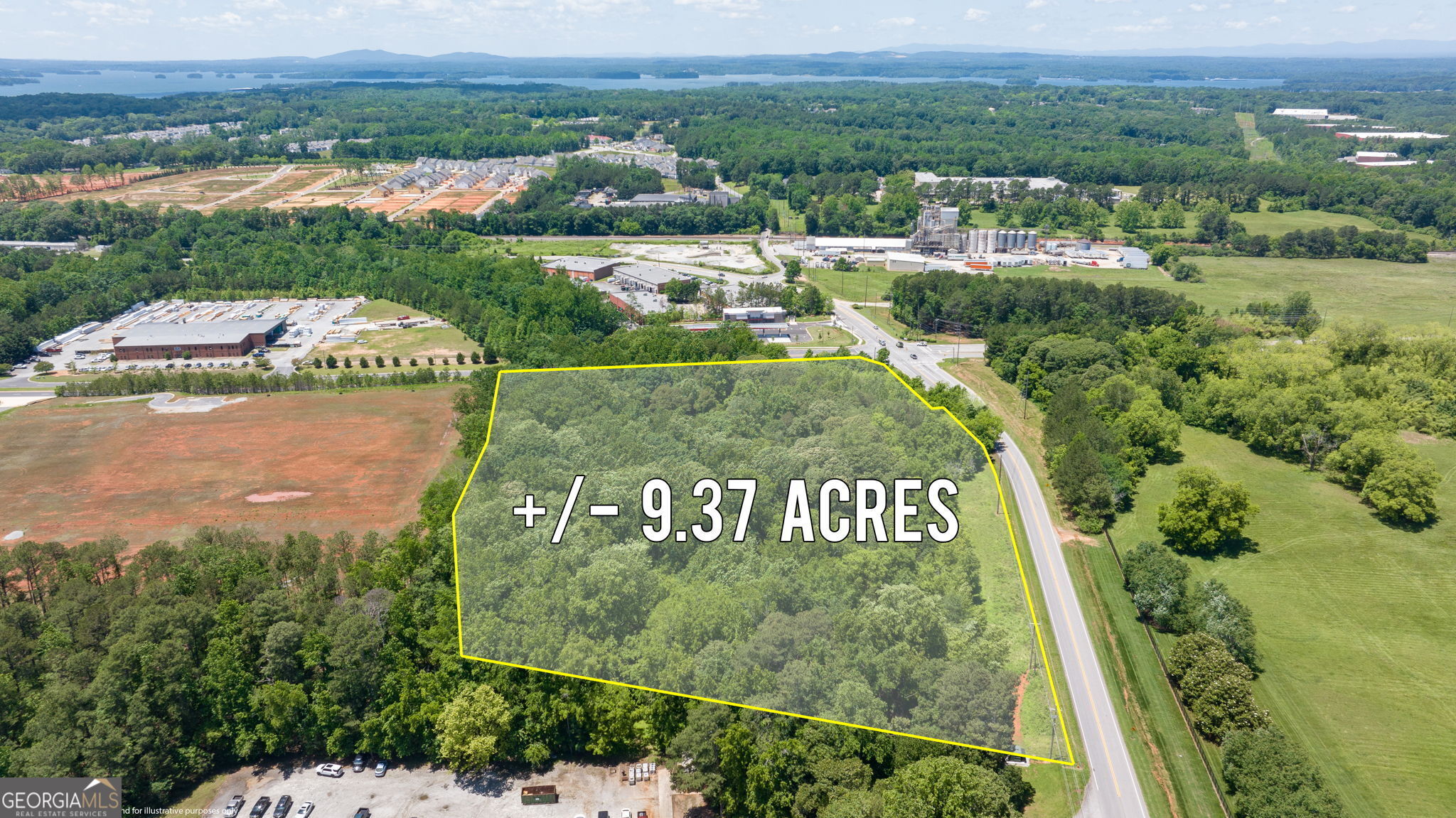 4611 Thurmon Tanner Road Flowery Branch, GA 30542 - Photo 12 of 23 an aerial view of a garden