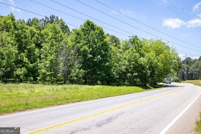 a view of yard with trampoline