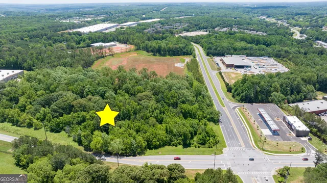 an aerial view of a house with a garden
