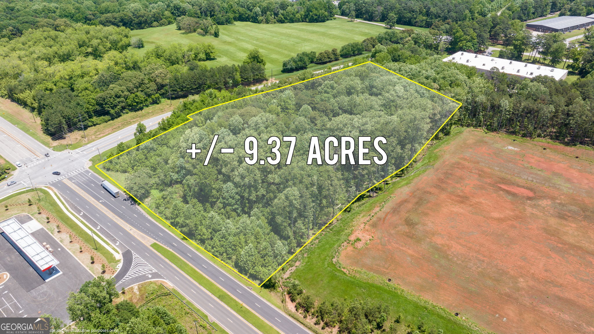 4611 Thurmon Tanner Road Flowery Branch, GA 30542 - Photo 9 of 23 a view of a street with a park