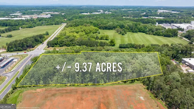 an aerial view of lake residential houses with outdoor space and swimming pool