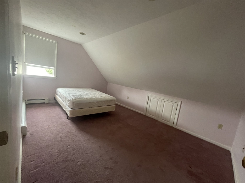 20 Studley Street Fairhaven, MA 02719 - Photo 11 of 16 a living room with furniture and a window