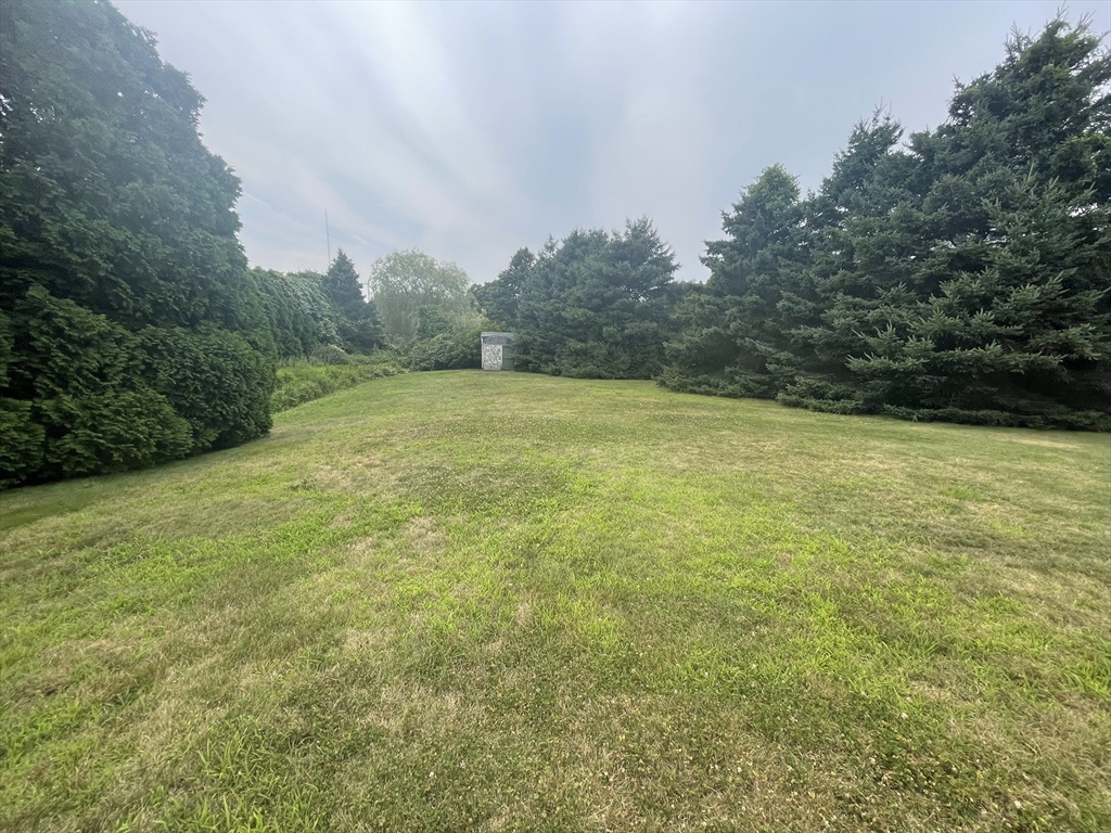 20 Studley Street Fairhaven, MA 02719 - Photo 15 of 16 a view of a big yard with an outdoor space