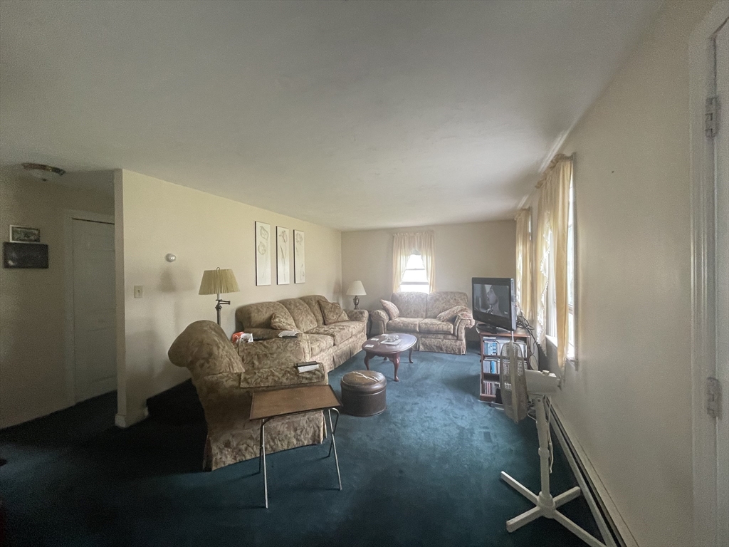 20 Studley Street Fairhaven, MA 02719 - Photo 7 of 16 a living room with furniture and a window