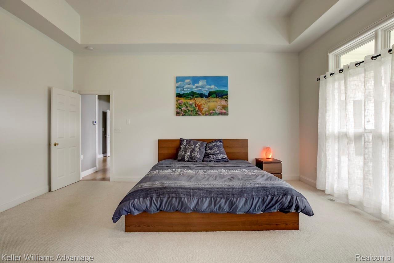 4558 Vines Road Howell, MI 48843 - Photo 11 of 46 Master Bedroom off of the Great Room and Deck
