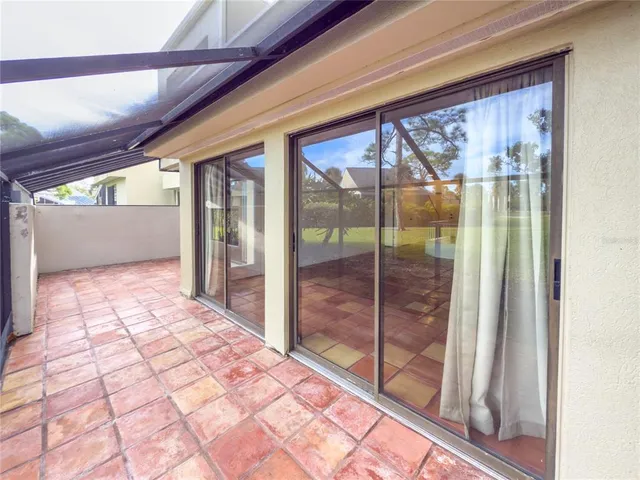 swimming pool view with a garden space