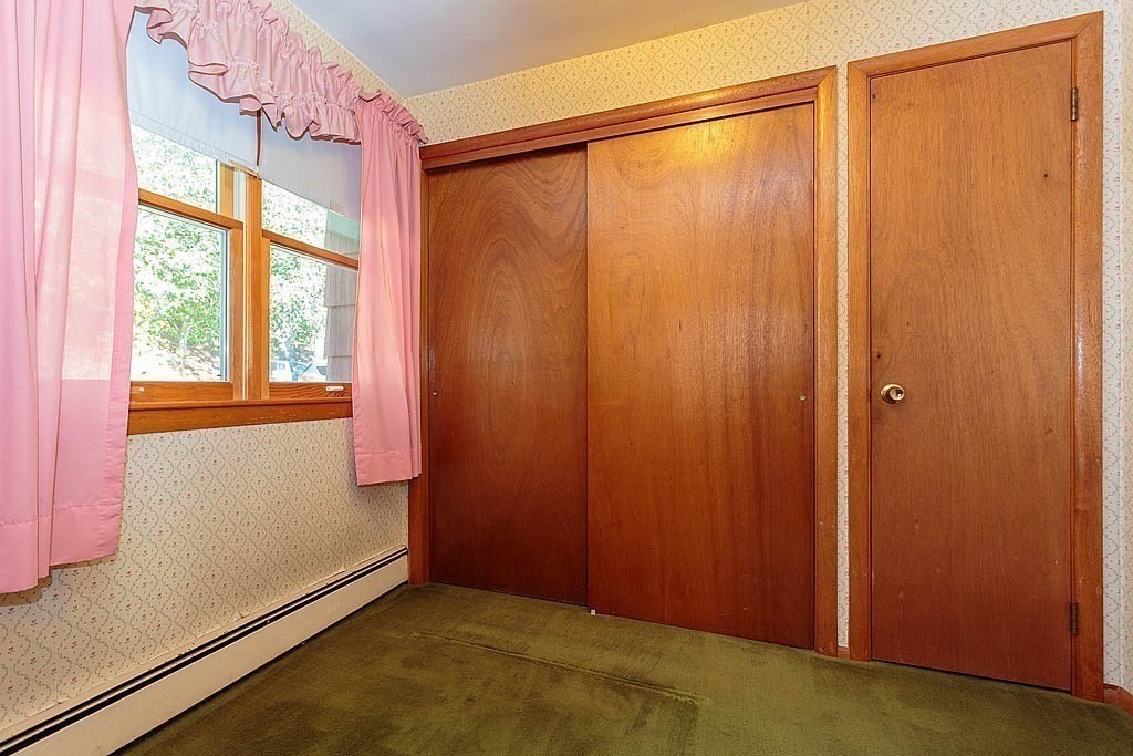 74 Summer Hill Road Maynard, MA 01754 - Photo 13 of 27 wooden floor and windows in an empty room