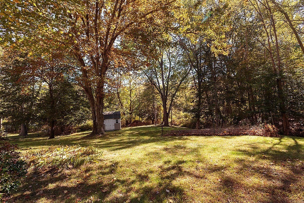 74 Summer Hill Road Maynard, MA 01754 - Photo 18 of 27 a view of swimming pool with large trees