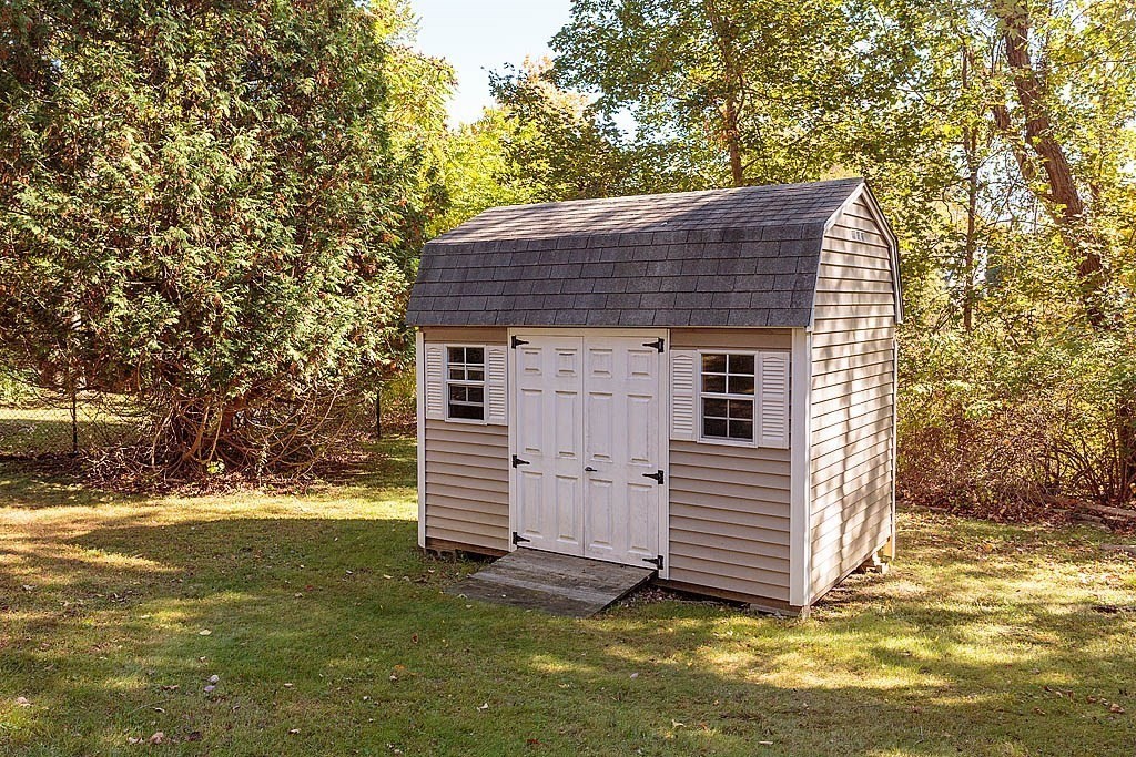 74 Summer Hill Road Maynard, MA 01754 - Photo 20 of 27 a view of a house with a yard