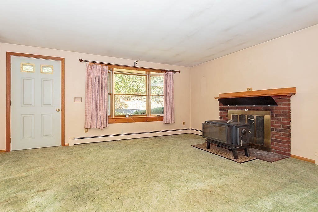 74 Summer Hill Road Maynard, MA 01754 - Photo 9 of 27 an empty room with windows