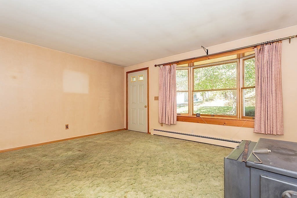 74 Summer Hill Road Maynard, MA 01754 - Photo 10 of 27 a view of an empty room with a window