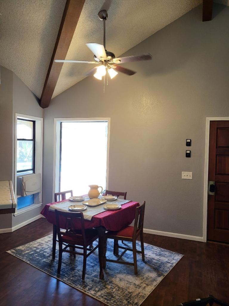 308 Monroe Street Coalinga, CA 93210 - Photo 12 of 35 a view of a dining room with furniture and wooden floor