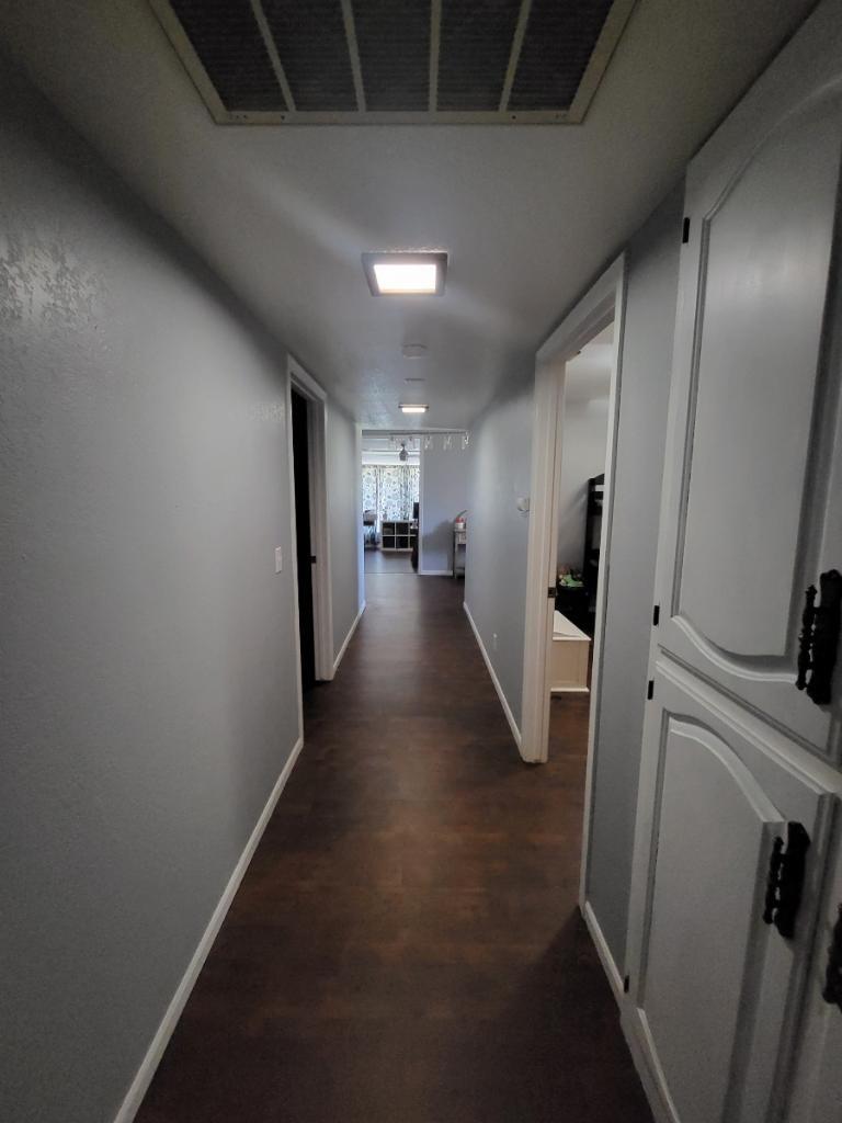 308 Monroe Street Coalinga, CA 93210 - Photo 19 of 35 a view of a hallway