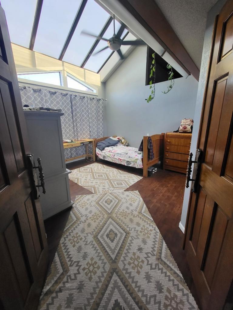 308 Monroe Street Coalinga, CA 93210 - Photo 26 of 35 a bedroom with furniture and a window