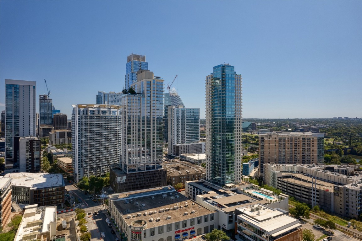 a view of city with tall buildings