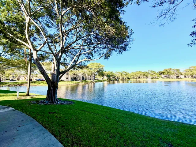 a room with gym equipment and a large window