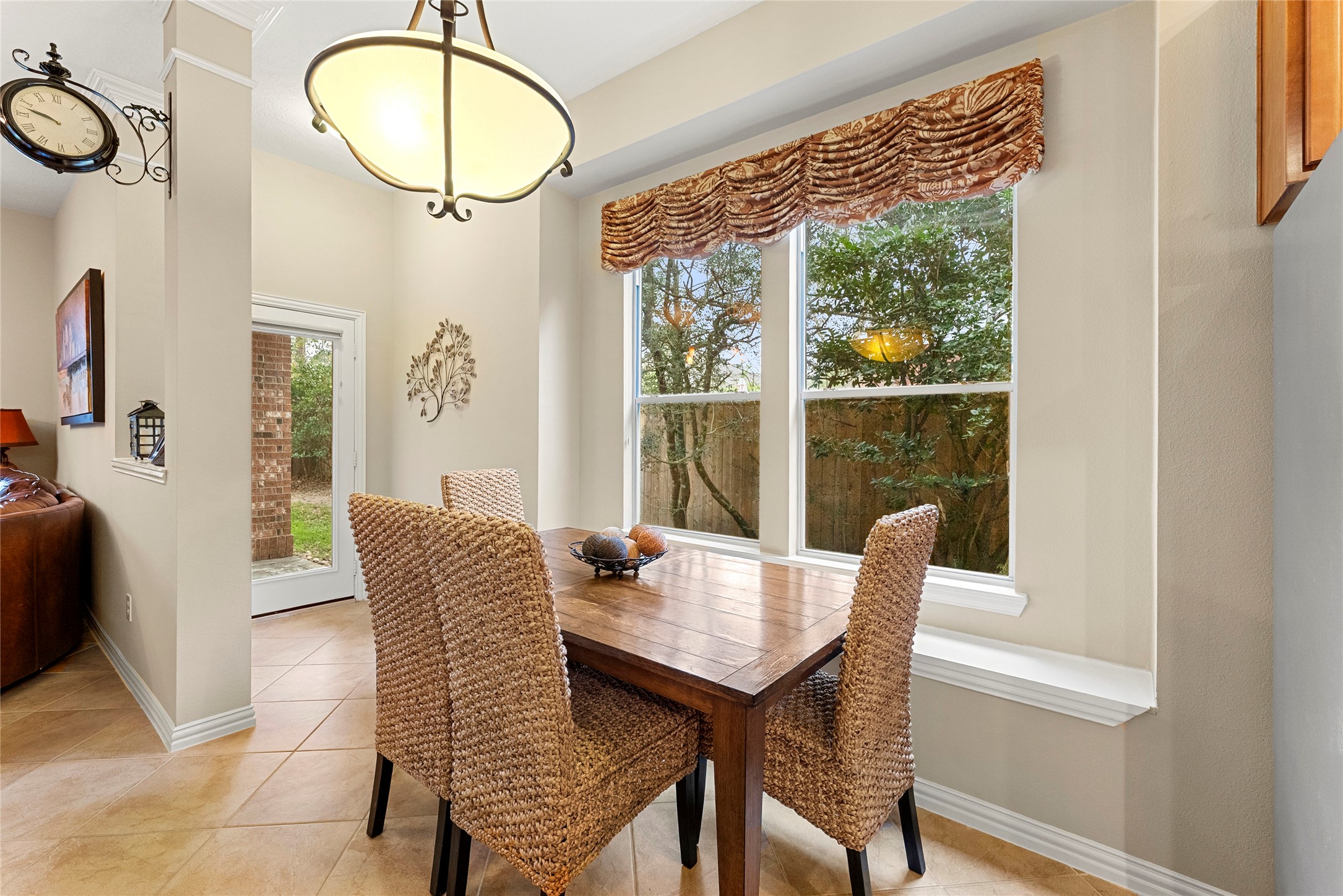 55 Granite Path Place Spring, TX 77389 - Photo 19 of 50 a view of a dining room with furniture window and wooden floor