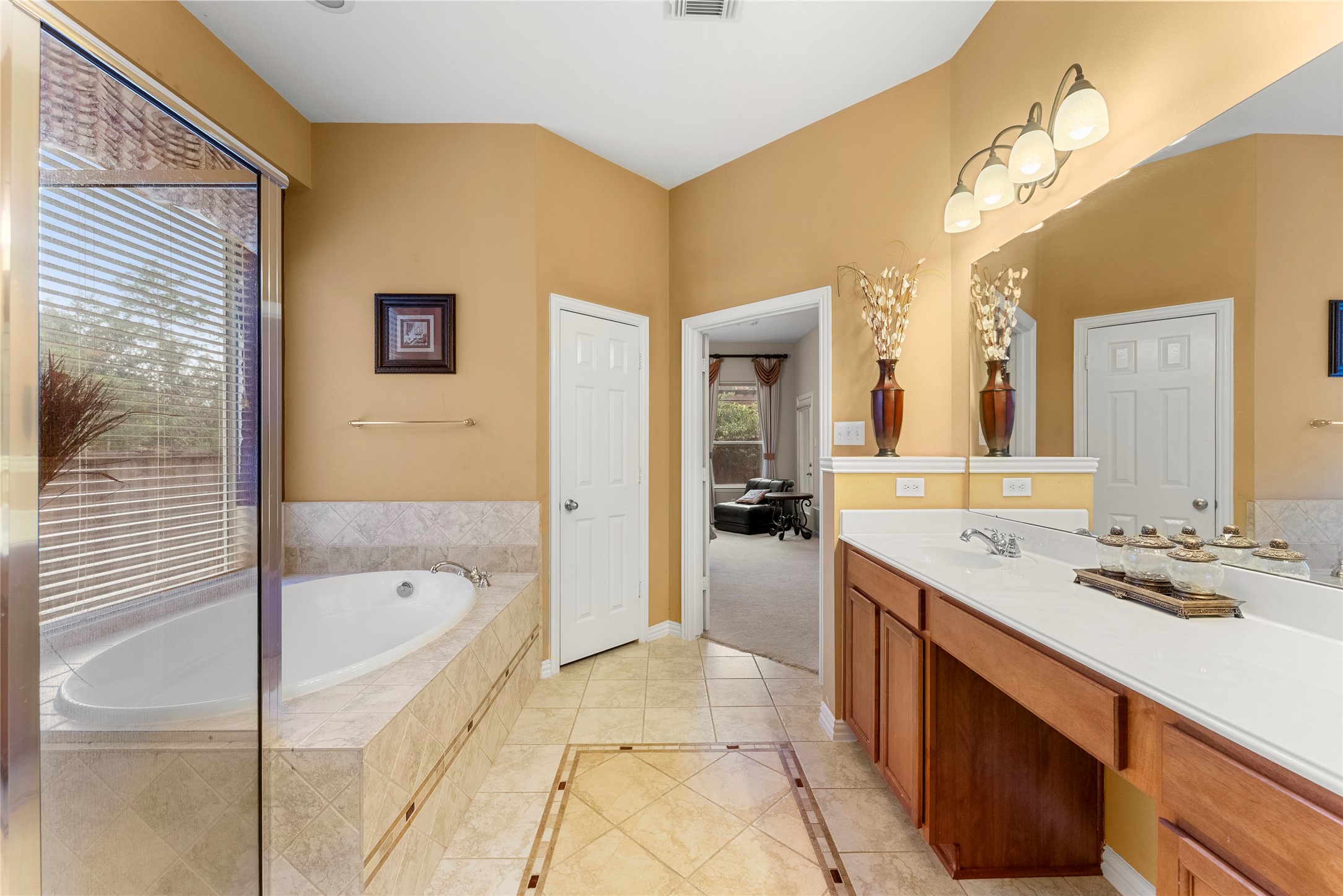 55 Granite Path Place Spring, TX 77389 - Photo 28 of 50 a spacious bathroom with a tub sink shower and mirror