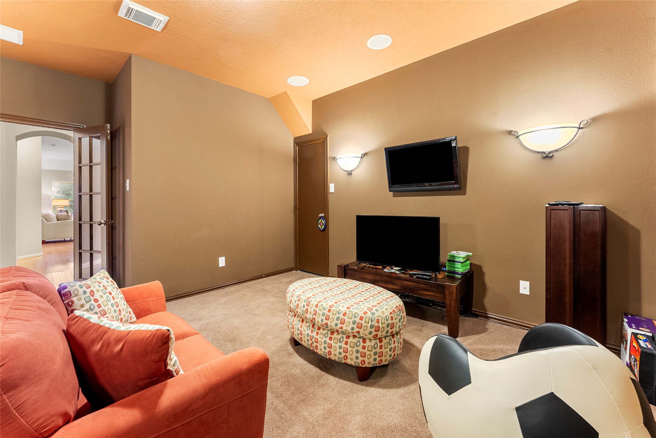 55 Granite Path Place Spring, TX 77389 - Photo 34 of 50 a bedroom with furniture and a flat screen tv