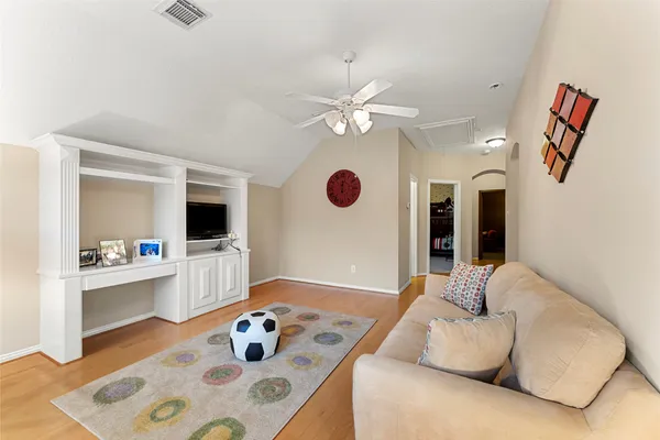 a kitchen with stainless steel appliances granite countertop a stove and a refrigerator