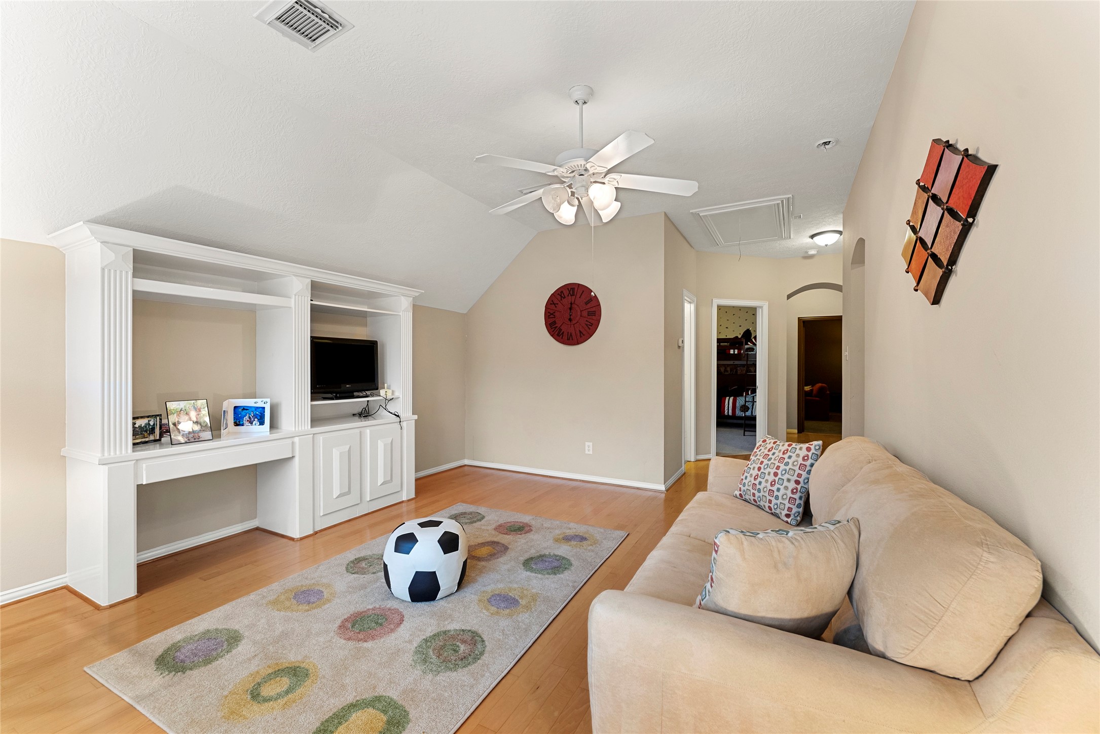 55 Granite Path Place Spring, TX 77389 - Photo 41 of 50 a living room with furniture and a flat screen tv
