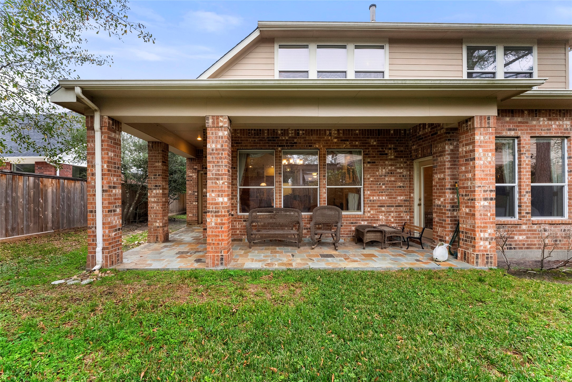 55 Granite Path Place Spring, TX 77389 - Photo 45 of 50 a view of a chair and table in front of house