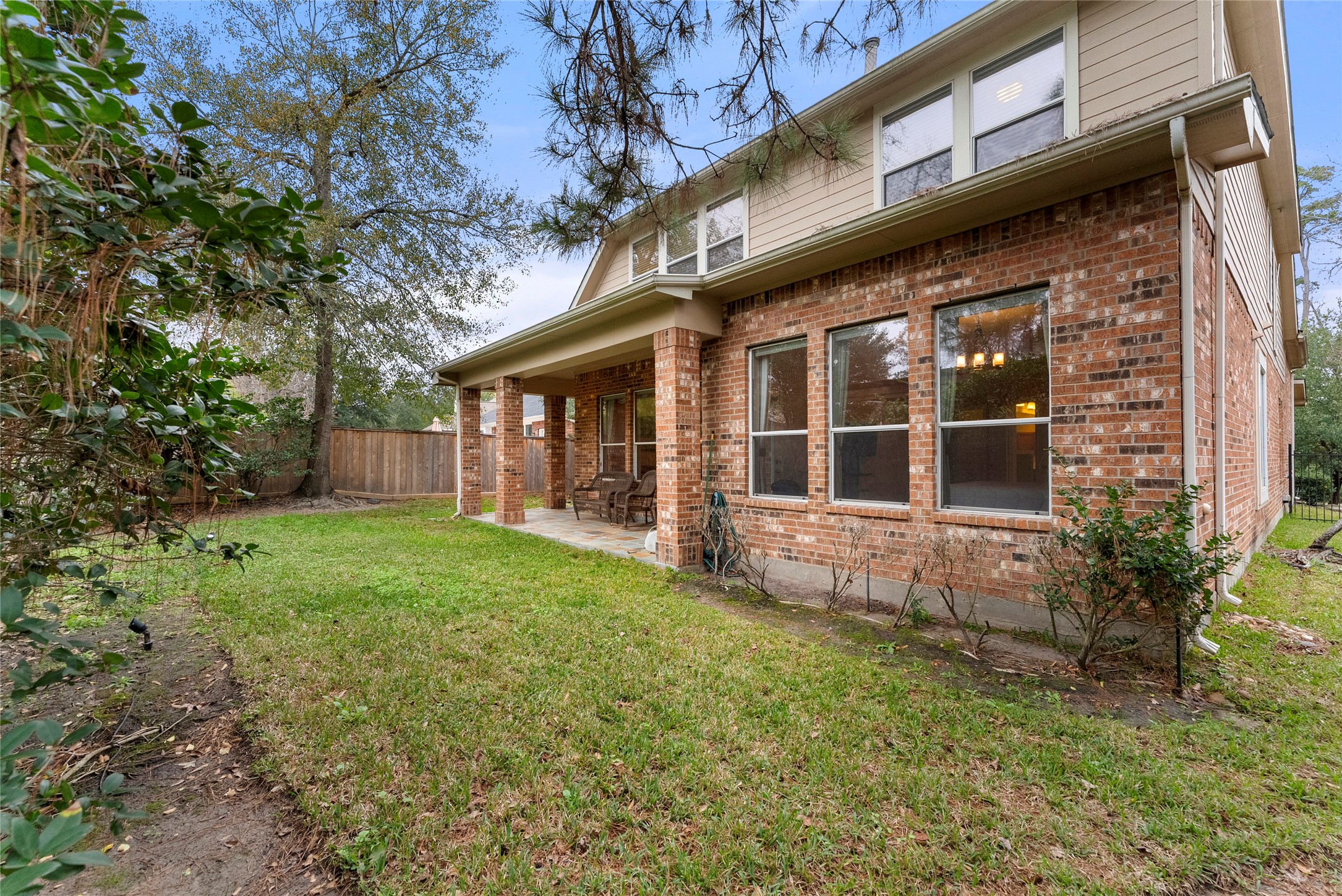 55 Granite Path Place Spring, TX 77389 - Photo 47 of 50 a view of house with backyard porch and garden
