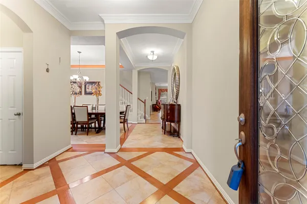a view of a livingroom with furniture and a window